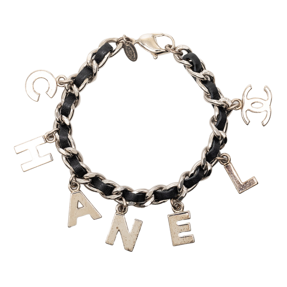 Pre-Loved Chanel Silver Plated and Leather Woven Logo Charm Bracelet